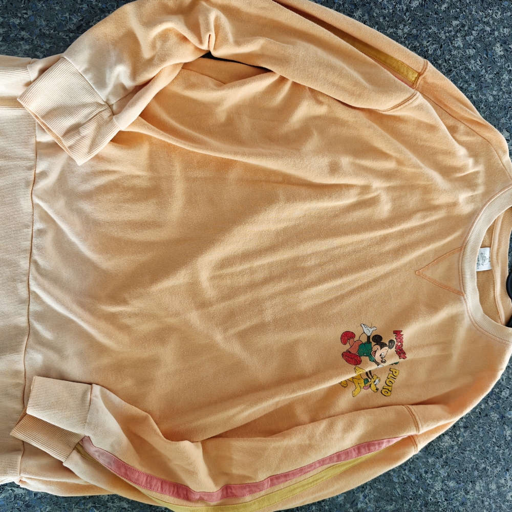 Peach Sweatshirt with Embroidered Character